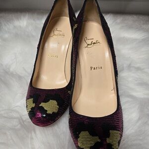 Christian Louboutin Women's Black and Gold Heels